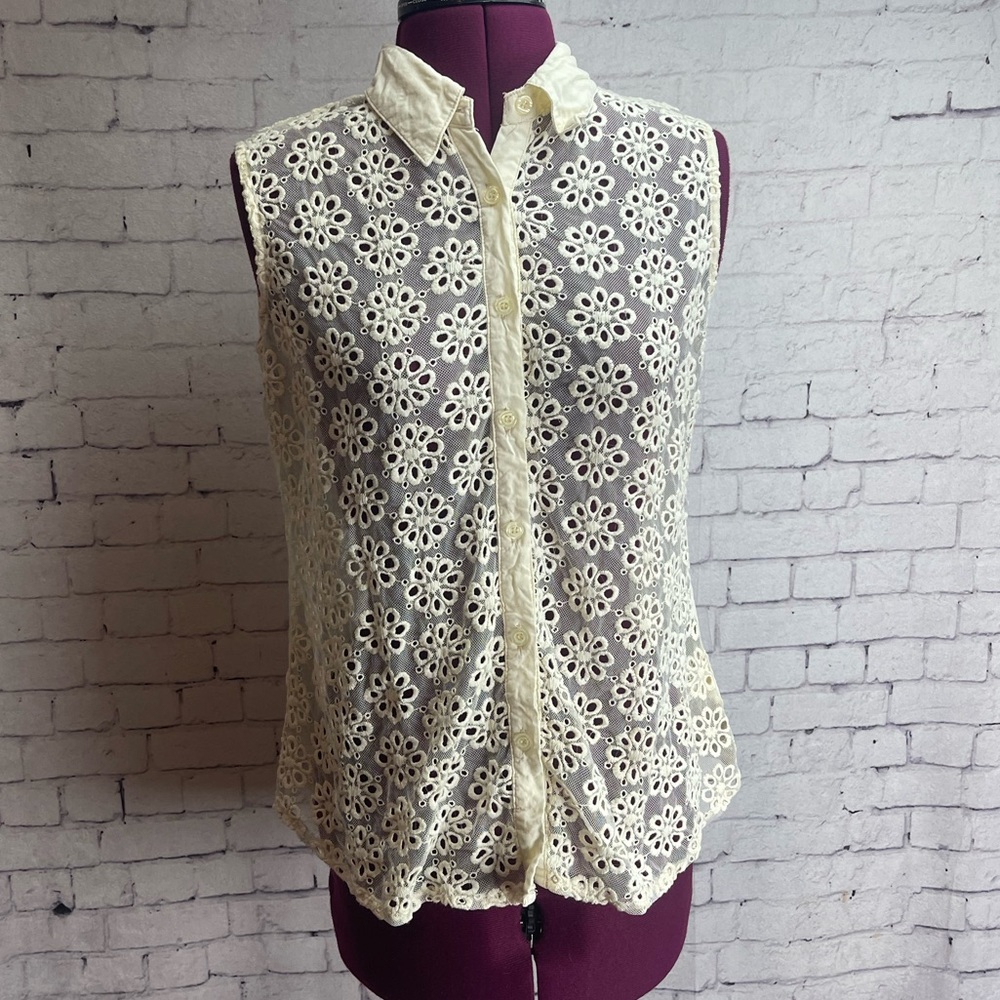Solitaire size medium cream colored eyelet lace  sleeveless button down shirt